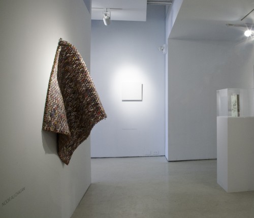 Noor Ali Chagani. Hanging Rug (re-used bricks) [installation view], 2014. Miniature terracotta bricks, metal wires, 43 x 29 x 0.5 in (109.2 x 73.7 x 1.3 cm). Courtesy of the artist and White Turban Art Consultancy.